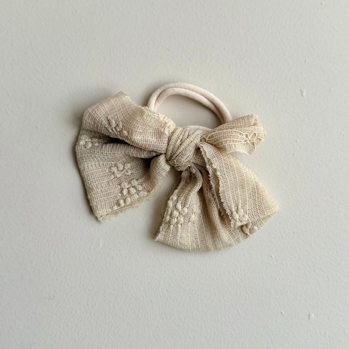 Haarelastiek met strik - taupe