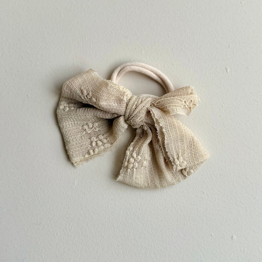 Haarelastiek met strik - taupe